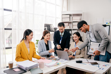 Brainstorming of young modern group. Team meeting to achieve goal. Business people discussing finance business and analysis. Teamwork concept in modern office. Calculating personal tax for client.