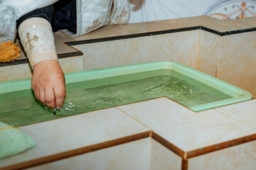 baby baptismal font, baptism ceremony