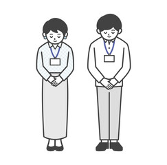 お辞儀をするオフィスカジュアル姿の男女（全身）