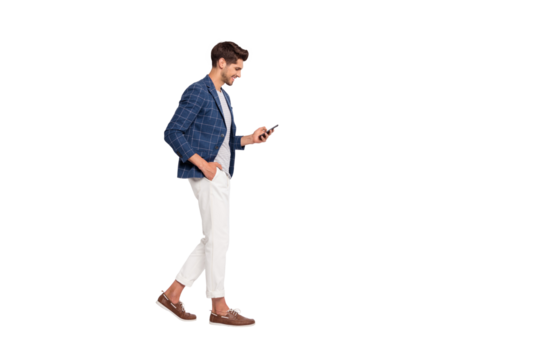 Full length body size view of nice attractive trendy cheerful cheery businessman wearing blue checked blazer using cell reading news feed reviewing feedback isolated over light white pastel background