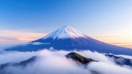 Fototapeta premium Majestic mountain peak, snow-capped, serene vista. Clouds swirl around