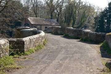  Stopham Bridge with The White Hart pub emerging behind. West Sussex, England