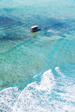 Aerial view of famous Cloudbreak reef surfing spot, Fiji