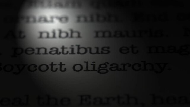 Boycott oligarchy. Moving text printed on a page. Slow motion.A piece of paper with a phrase written in retro typewriter font. Spotlight effect. Dark dramatic video.