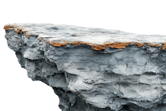 Rocky cliff edge with rugged texture and earthy tones against a white isolated background.