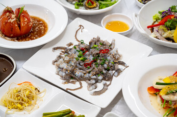 Korean food. Chopped live octopus