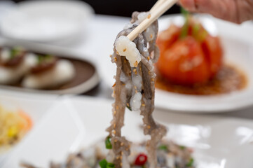 Korean food. Chopped live octopus