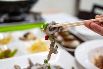 Korean food. Chopped live octopus