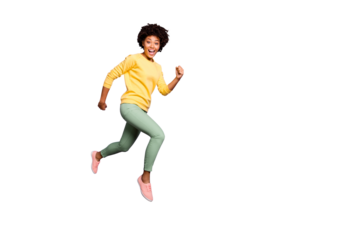 Full length profile side photo of amazed funny crazy afro american girl jump run hurry autumn fall black friday bargain wear green sweater yellow pants trousers isolated violet color background