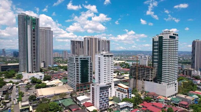 Pasig, Metro Manila, Philippines : Apr 17, 2025 &mdash; Aerial view of high-rise buildings, hotels, and construction sites around Shaw Boulevard and Capitol Commons area in Barangay Oranbo.