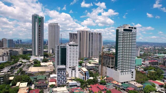 Pasig, Metro Manila, Philippines : Apr 17, 2025 &mdash; Aerial view of high-rise buildings, hotels, and construction sites around Shaw Boulevard and Capitol Commons area in Barangay Oranbo.