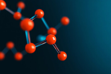 Molecular structure with vibrant orange spheres connected by thin rods against dark blue background.