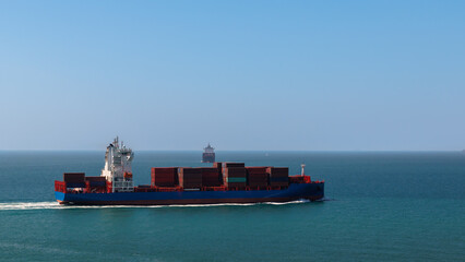 container ship carrying goods for international import export, business and industry regarding...