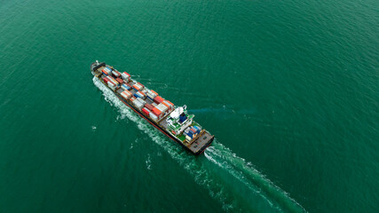 container ship carrying goods for international import export, business and industry regarding...