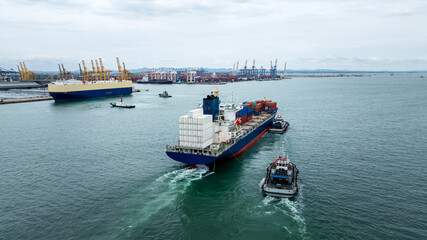 container ship carrying goods for international import export, business and industry regarding...