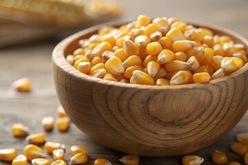 Close-Up of Yellow Dried Corn Kernels in Wooden Bowl – Rustic Natural Texture