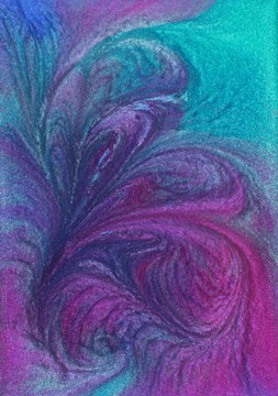 Colorful glitter ink swirls form an enchanting abstract design