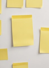 Fototapeta premium Bright yellow sticky note, close-up, white background, close-up, adhesive, reminder note