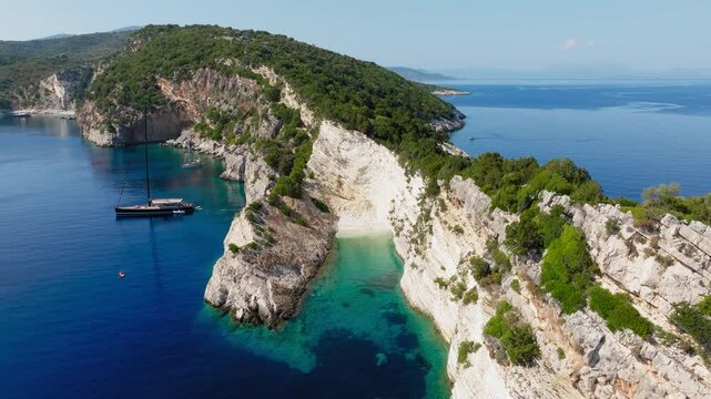 Cliffside terrain and deep water coastline at Hulla Beach, Ithaca Island, Greece