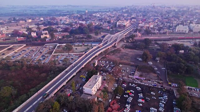 ayodhya parking area view with Railway Overbridge and trees at day time, push in, drone shot, 4k.
