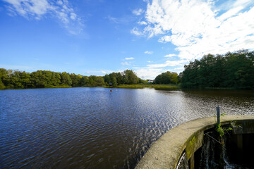 Obraz premium View of the mill pond near Bredstedt and the surrounding landscape. Nature at the Bredstedt mill pond. 