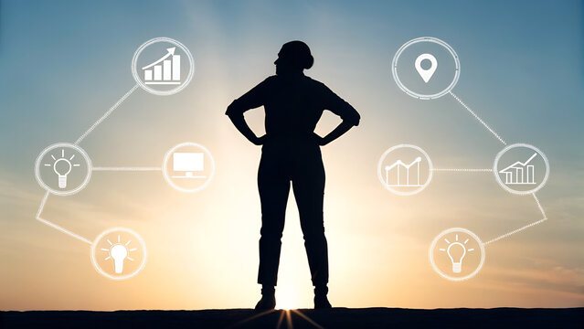 Solopreneur Business Freelance Independent Silhouette of a person with icons representing data and technology against a sunset background.