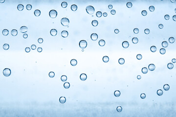 Soda water with bubbles as background, closeup