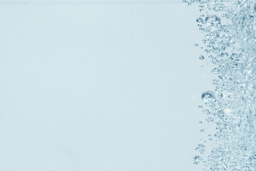 Soda water with bubbles as background, closeup
