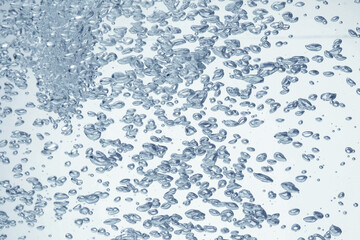 Soda water with bubbles as background, closeup
