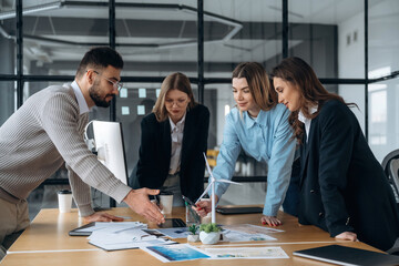 Power management in wind turbine company. Business people are working in the office