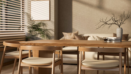 Set of a wooden table and armchairs next to window with bright sunlight. Cosy library or study room.