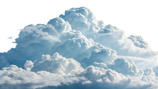 Fluffy white clouds floating in a clear sky during daytime