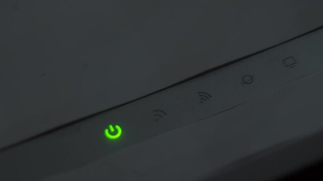 Router power and connection lights sequentially activating, signaling network status through blinking leds and culminating in a red error indicator of potential connectivity problem