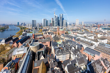 Frankfurt skyline skyscrapers in city center with the Römer and Main river from above in...