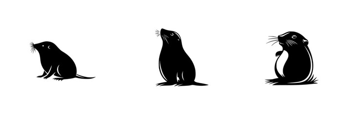 Obraz premium Set of three black icons representing different animals, showcasing their unique postures and features in a minimalist design