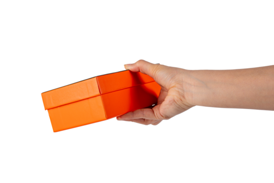 Orange box in hand isolated on transparent background 
