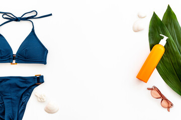 Beach female lifestyle clothes and accessories. Flat lay, top view