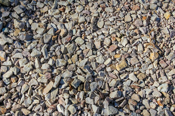 Detailed Close-up of Gray Gravel Stones Texture Creating Natural Construction Material Background Pattern