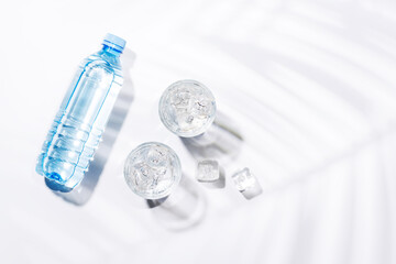 Crystal-clear glasses filled with chilled water and ice cubes