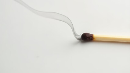 Burnt Match With Smoke On White