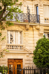 Dreamy spring details of a parisian building from the street - Paris