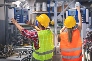 Fototapeta na wymiar Workers in modern pvc factory at work