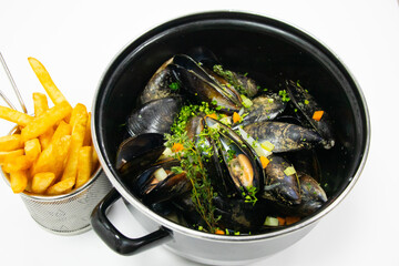steamed dutch mussels in cream sauce pot with white background