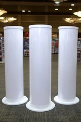 White Cylindrical Displays in Retail