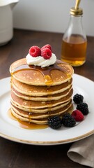 A Delectable Stack of Fluffy Pancakes Drizzled with Golden Syrup and Topped with Cream and Fresh, Juicy Berries.