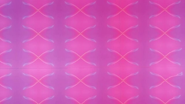 Abstract pink pattern with flowing lines creating a vibrant and dynamic background suitable for design