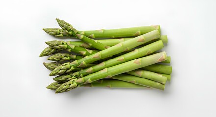 Fresh green asparagus spears isolated on white background with shadow for healthy eating concepts. Organic asparagus vegetable top view on white background for vegan and vegetarian diet visuals