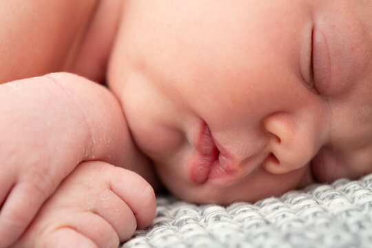 Face of sleeping newborn baby