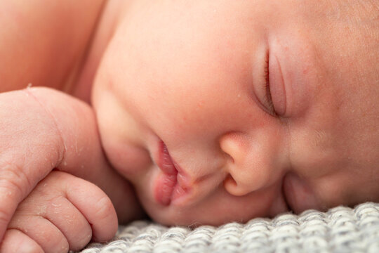 Face of sleeping newborn baby