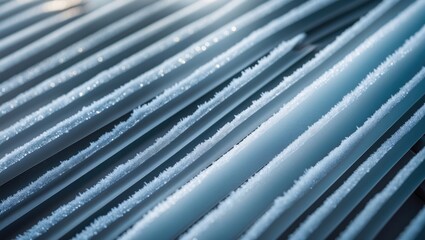 Fototapeta premium Close-up view of frost-covered ice crystals on a structure with angled slats